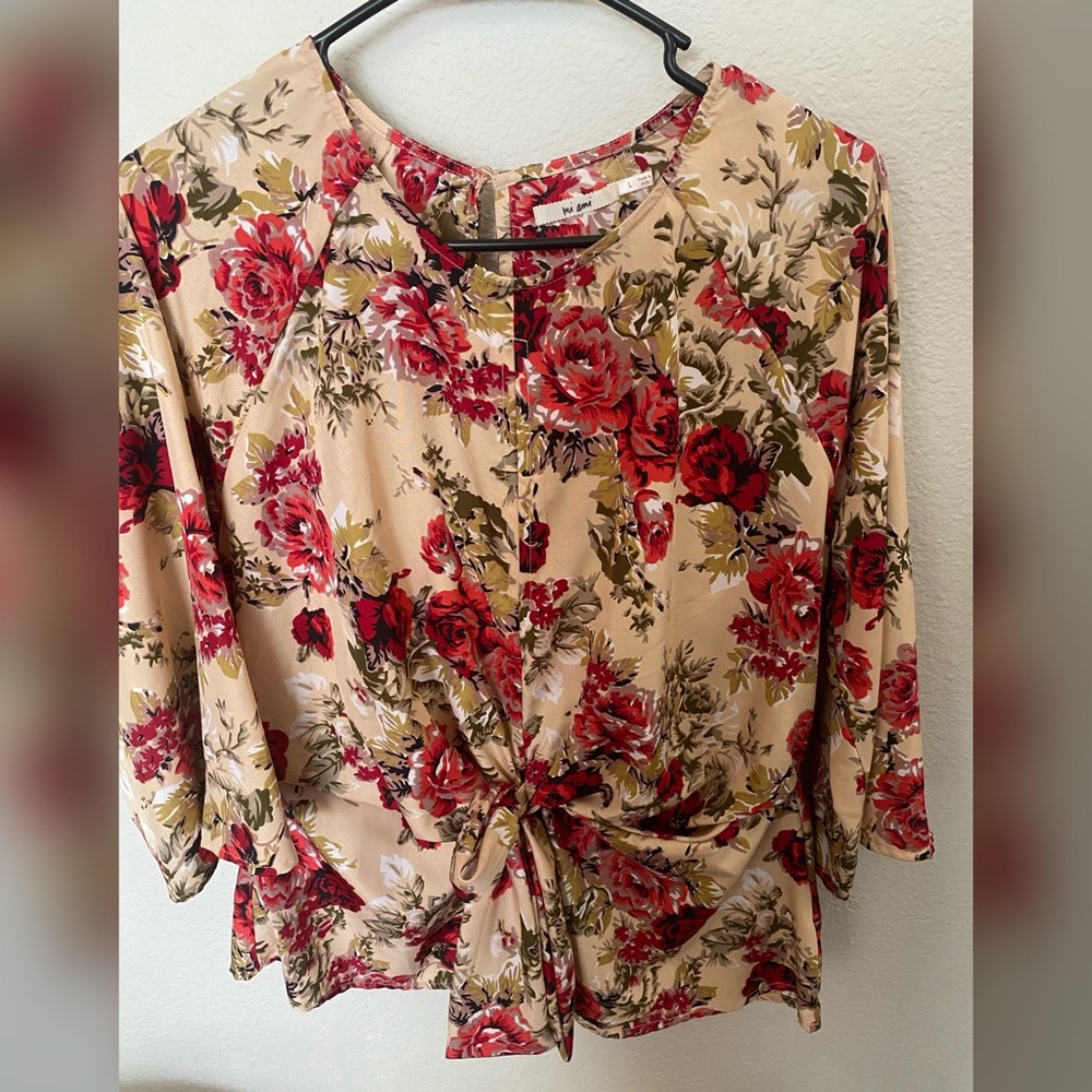 Floral top knotted in front.